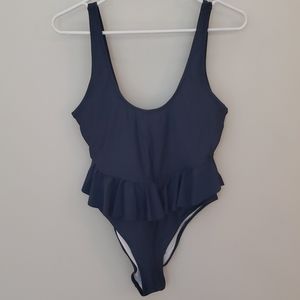 Cheeky high cut one-piece w/ peplum waist